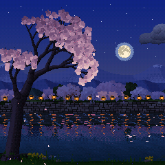 Sakura at night: the tree lit up, lanterns along the far bank, their light on the river